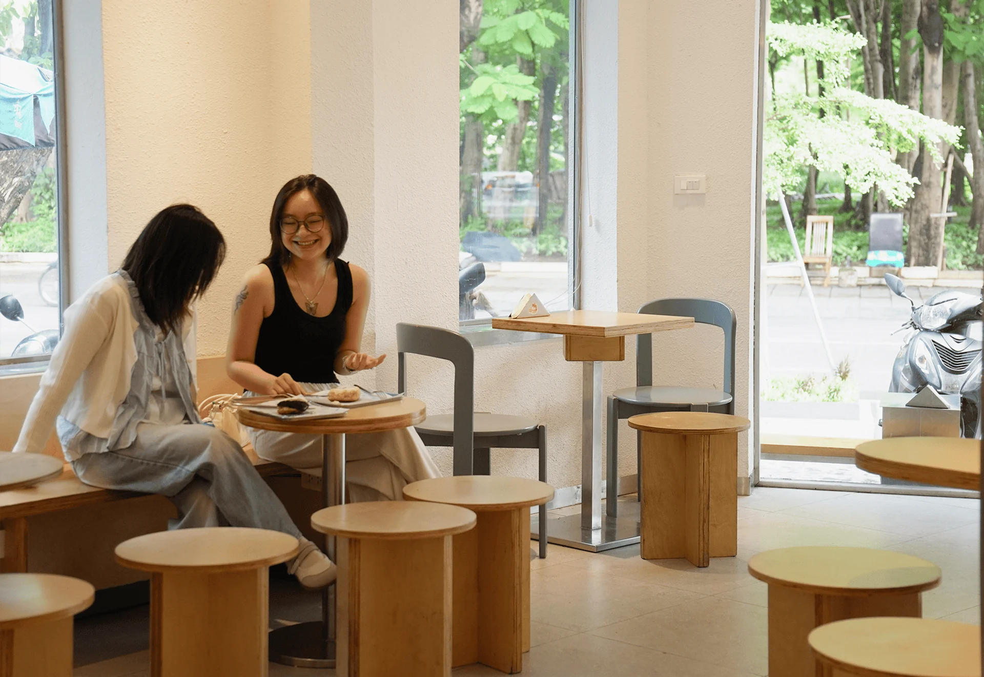 Guests enjoying donuts and drinks inside Lim Donuts